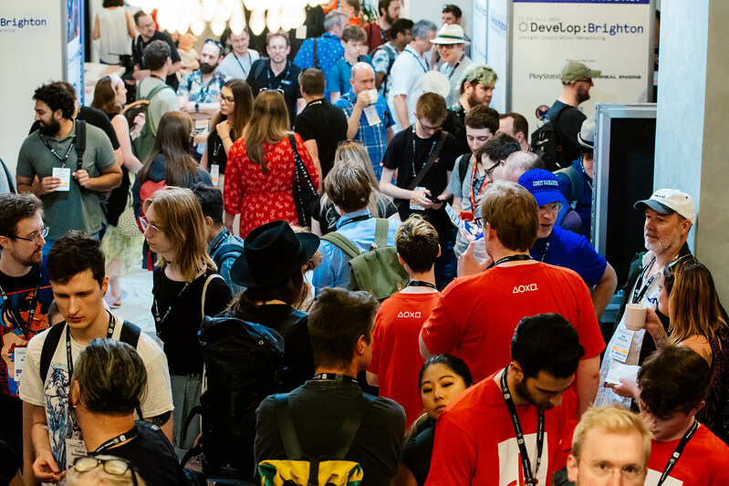 An image from the venue's lobby that often is used as a centralised point to meet and network with people. The lobby is packed with people from all kinds of backgrounds, including Develop volunteers who help out the event organisers run the conference.